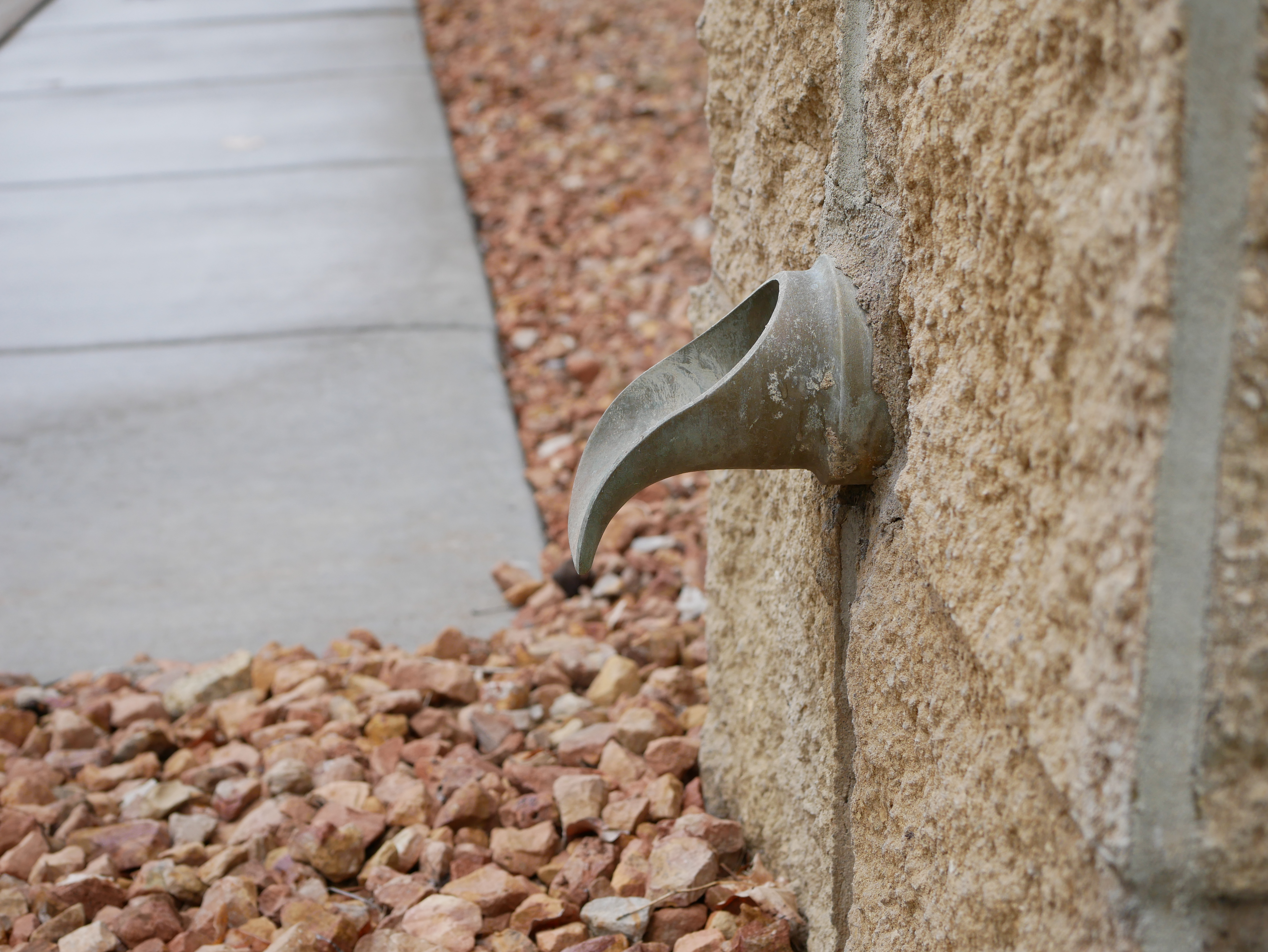 District office_2019Apr22_Downspout or scupper spilling to hard surface profile shot.JPG